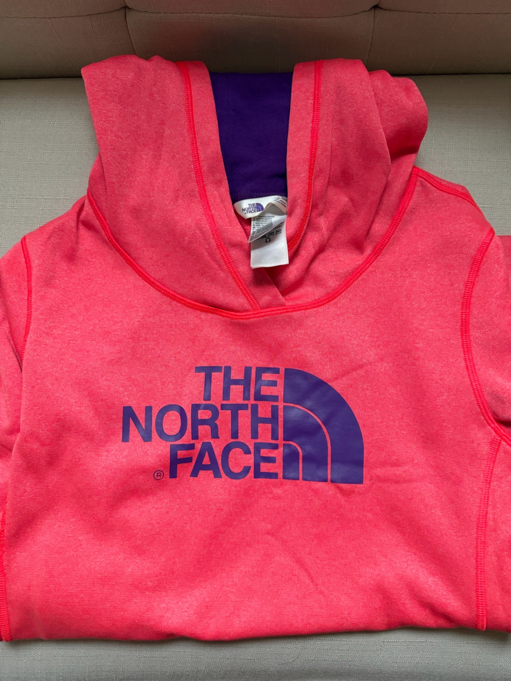 The North Face Kids Coral Pink Hoodie with Purple Logo